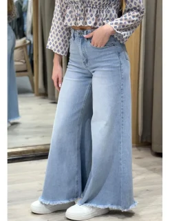 Jeans deshilachados super wide leg azul claro