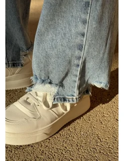 Jeans wideleg bajo deshilachado azul